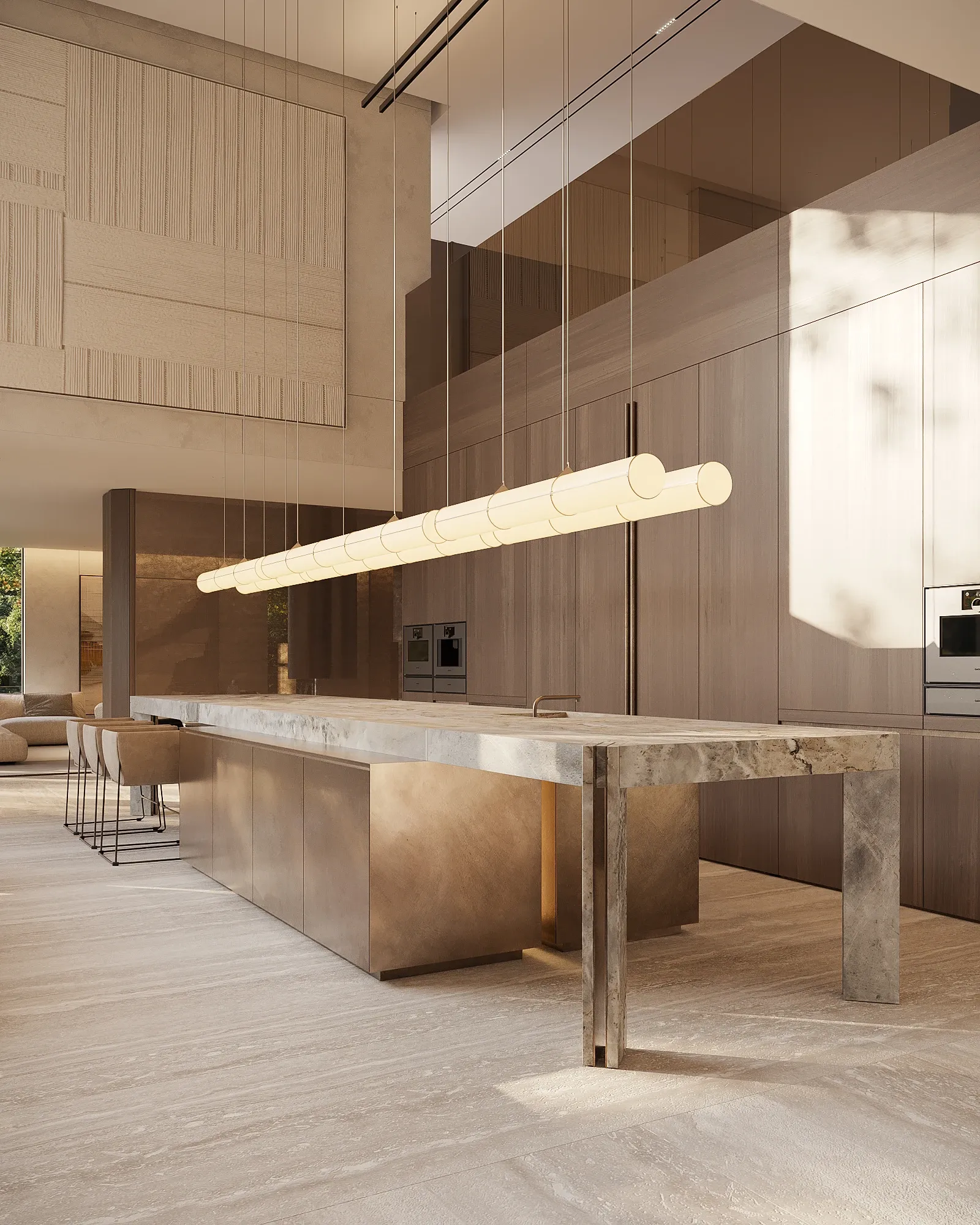 Double-height kitchen with stone island and bronze cabinetry under tube pendant, The Saucon Valley Residence, Pennsylvania