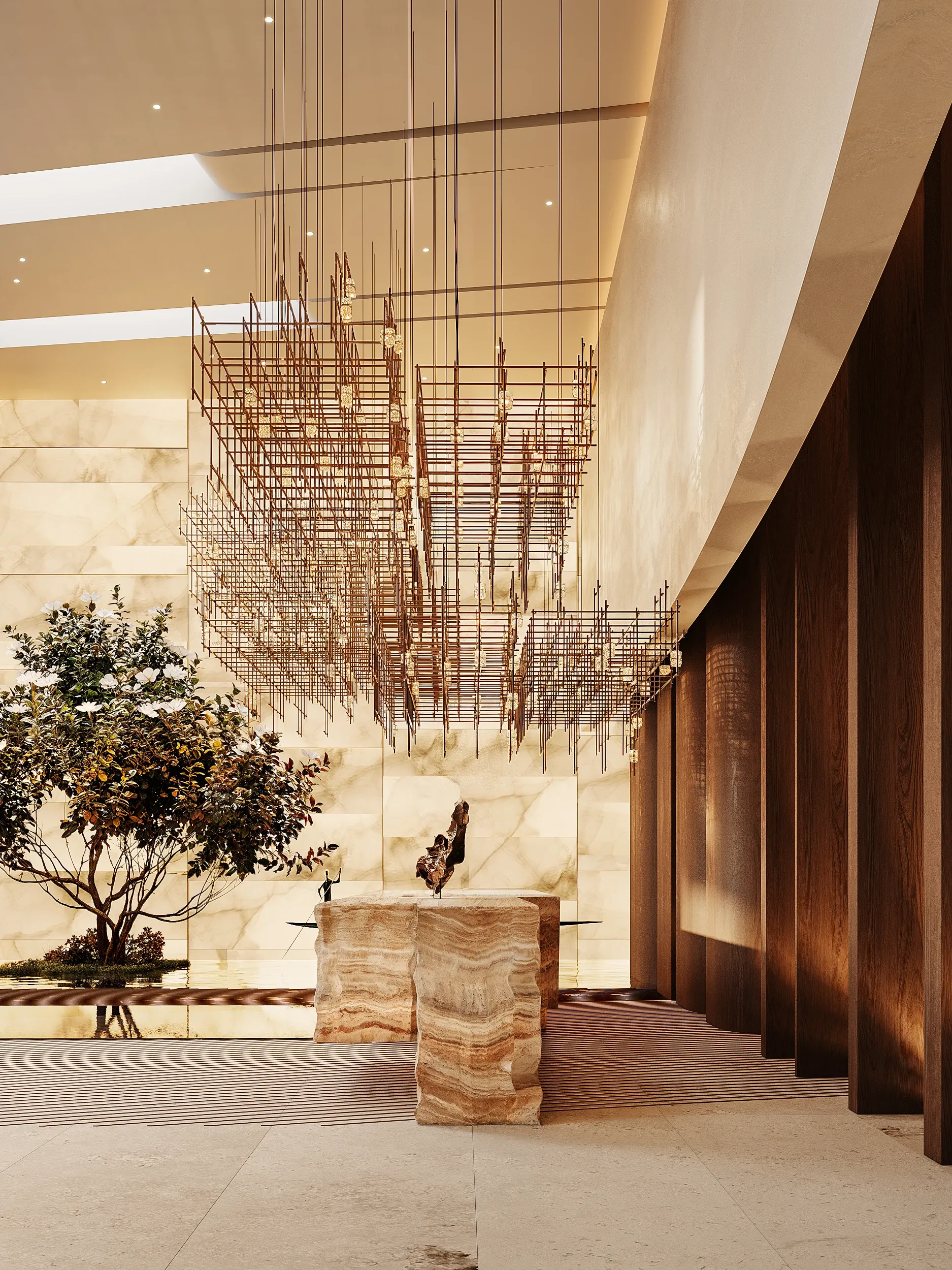 Lobby with onyx wall, sculptural pendant light and travertine pedestal, Masaya Restaurant, The Ritz-Carlton Bahrain