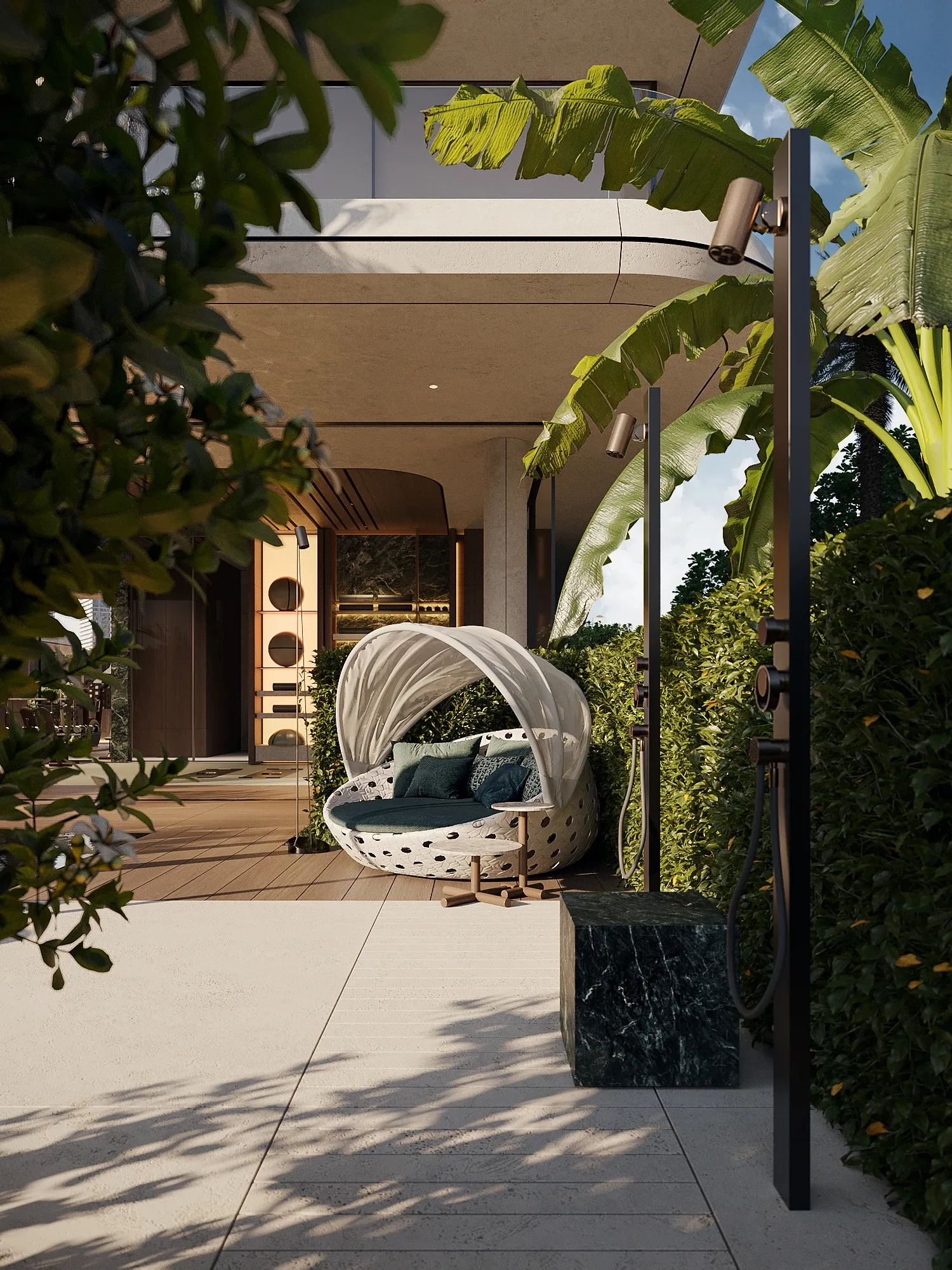 Garden terrace with canopied daybed and marble table amid lush foliage, The Lagoon, Dubai