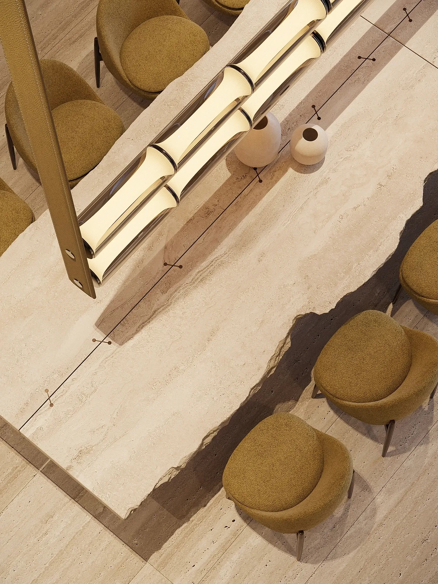 Overhead view of travertine floor inlay and mustard armchairs, The Crown Villa, Antalya